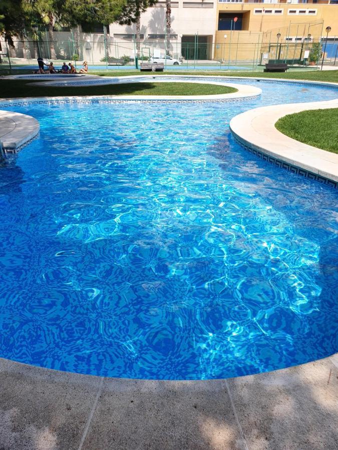 Apartment In Campoamor Overlooking The Swimming Pool Bagian luar foto