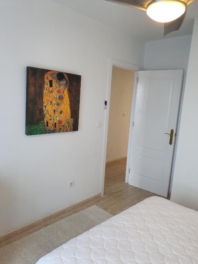 Apartment In Campoamor Overlooking The Swimming Pool Bagian luar foto
