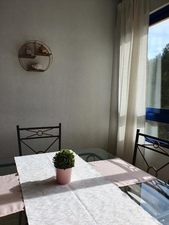 Apartment In Campoamor Overlooking The Swimming Pool Bagian luar foto