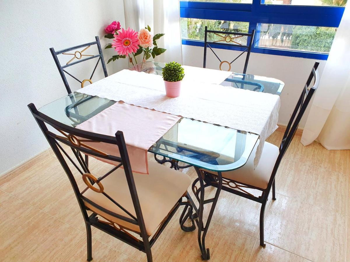 Apartment In Campoamor Overlooking The Swimming Pool Bagian luar foto