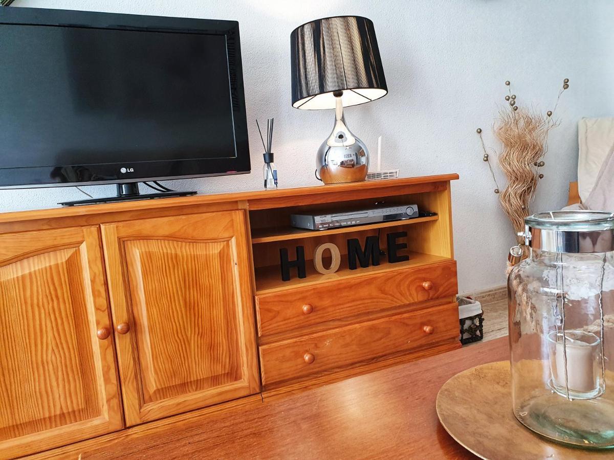 Apartment In Campoamor Overlooking The Swimming Pool Bagian luar foto
