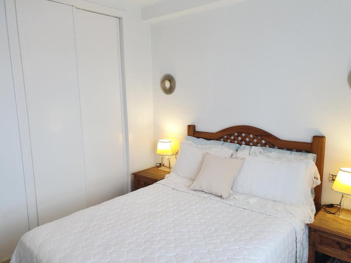 Apartment In Campoamor Overlooking The Swimming Pool Bagian luar foto