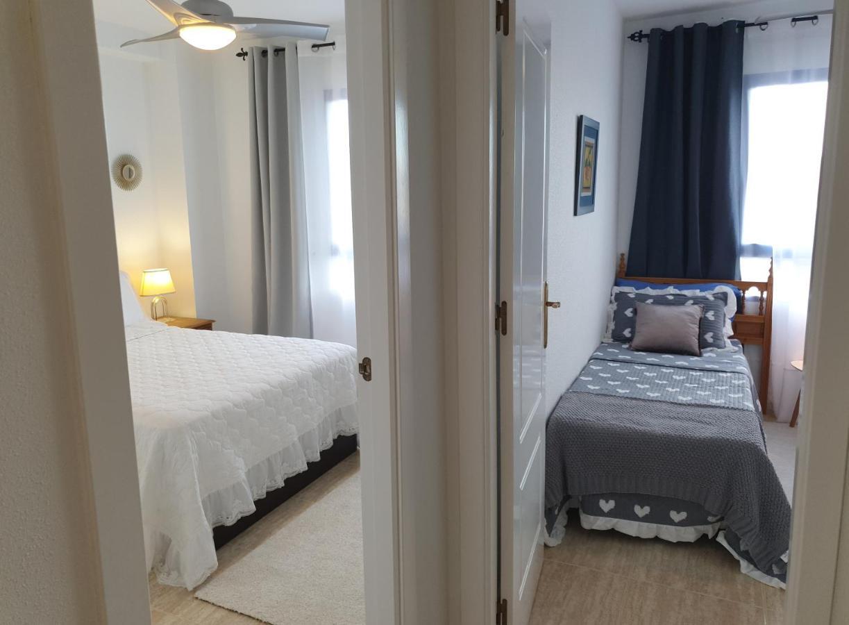 Apartment In Campoamor Overlooking The Swimming Pool Bagian luar foto