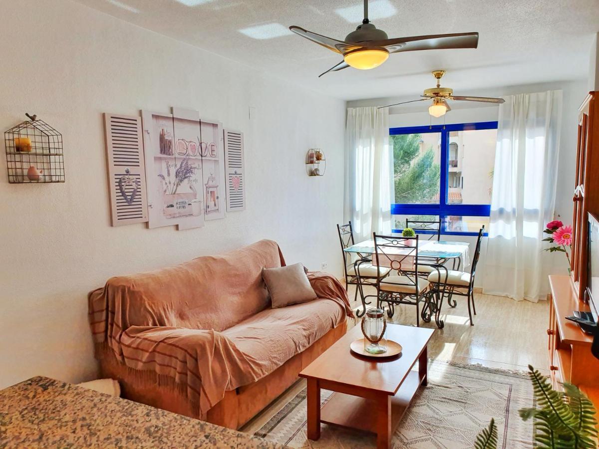 Apartment In Campoamor Overlooking The Swimming Pool Bagian luar foto
