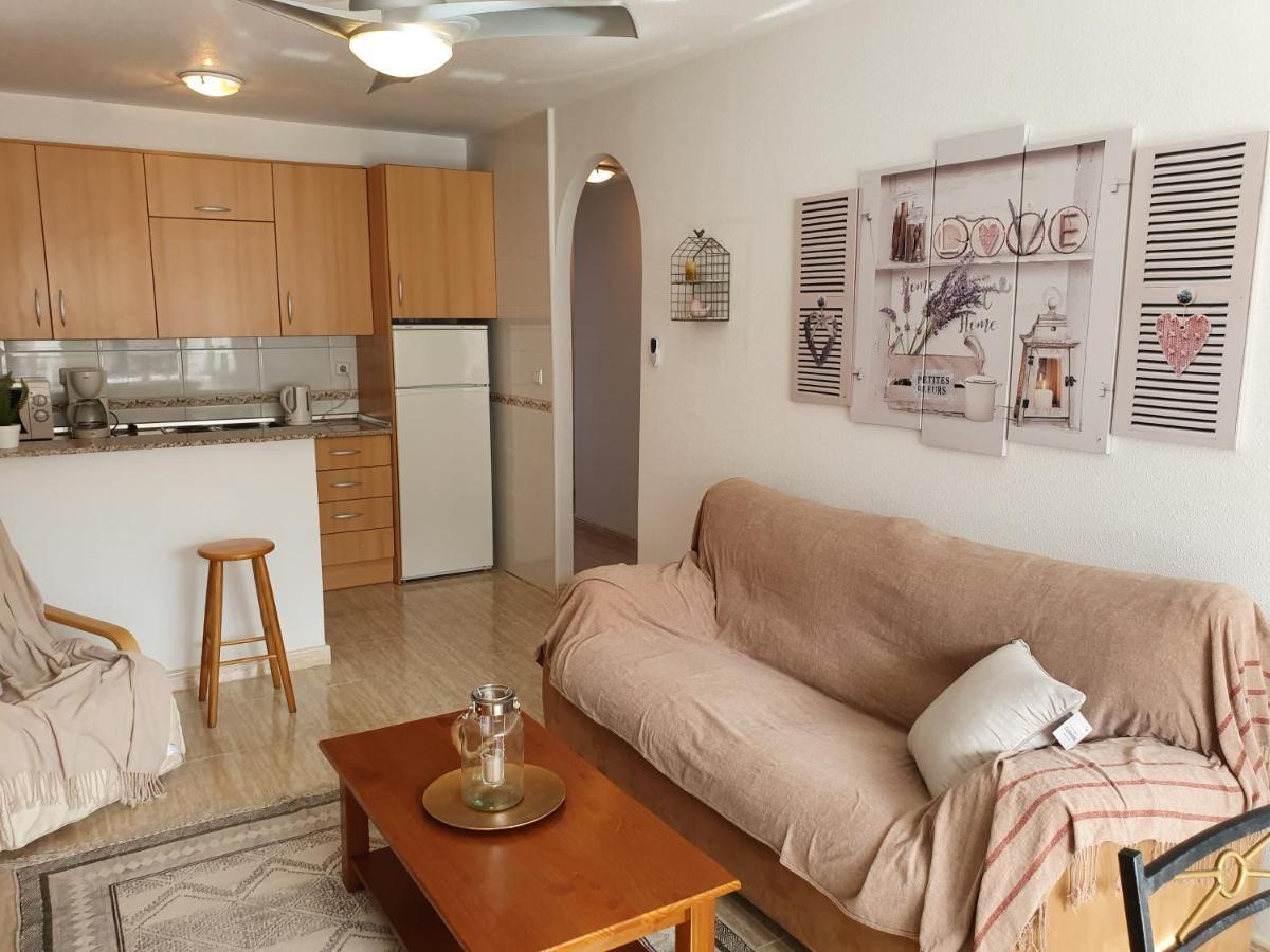 Apartment In Campoamor Overlooking The Swimming Pool Bagian luar foto
