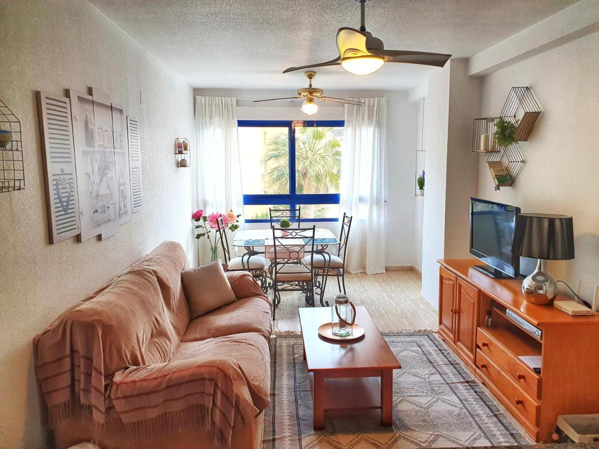 Apartment In Campoamor Overlooking The Swimming Pool Bagian luar foto