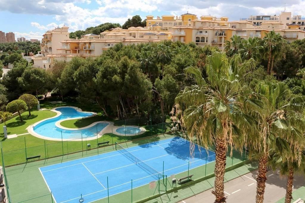 Apartment In Campoamor Overlooking The Swimming Pool Bagian luar foto