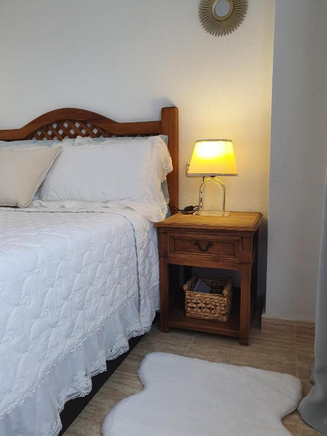 Apartment In Campoamor Overlooking The Swimming Pool Bagian luar foto