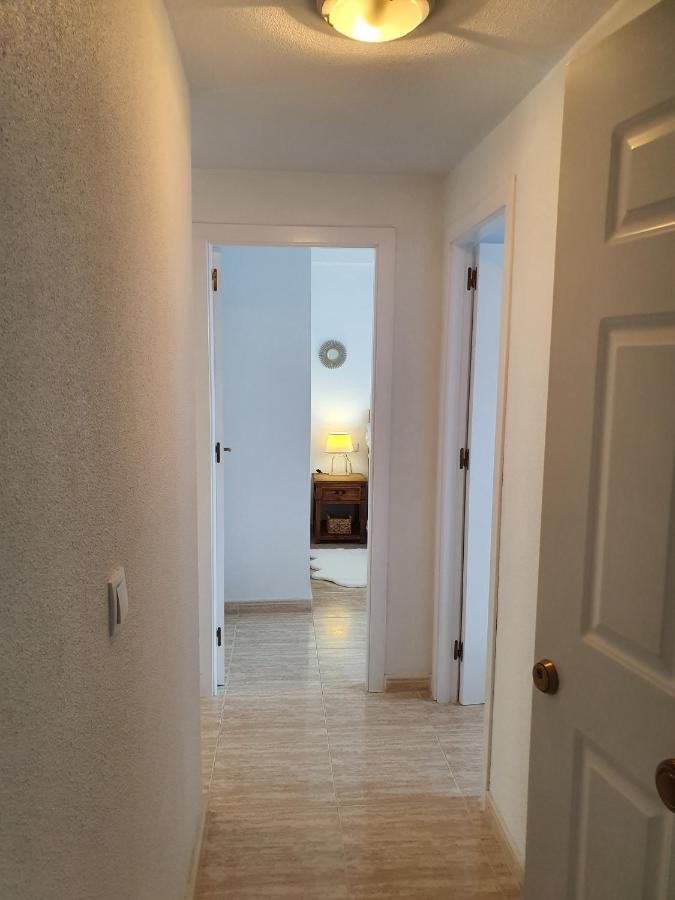 Apartment In Campoamor Overlooking The Swimming Pool Bagian luar foto