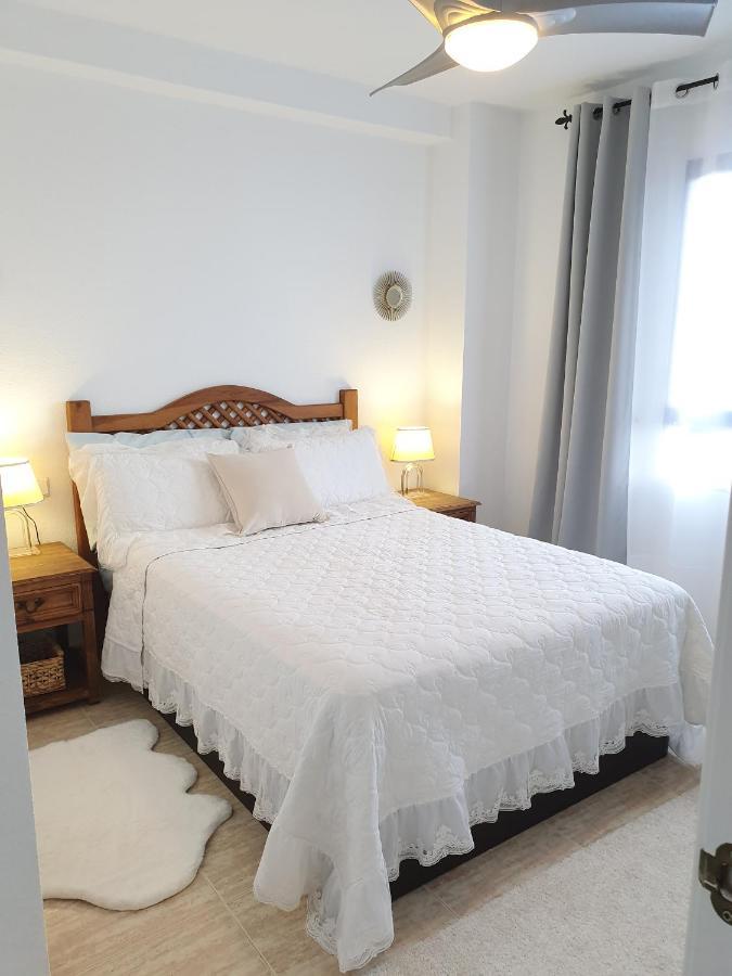 Apartment In Campoamor Overlooking The Swimming Pool Bagian luar foto