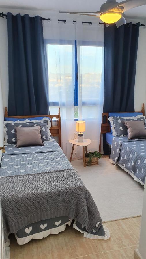 Apartment In Campoamor Overlooking The Swimming Pool Bagian luar foto