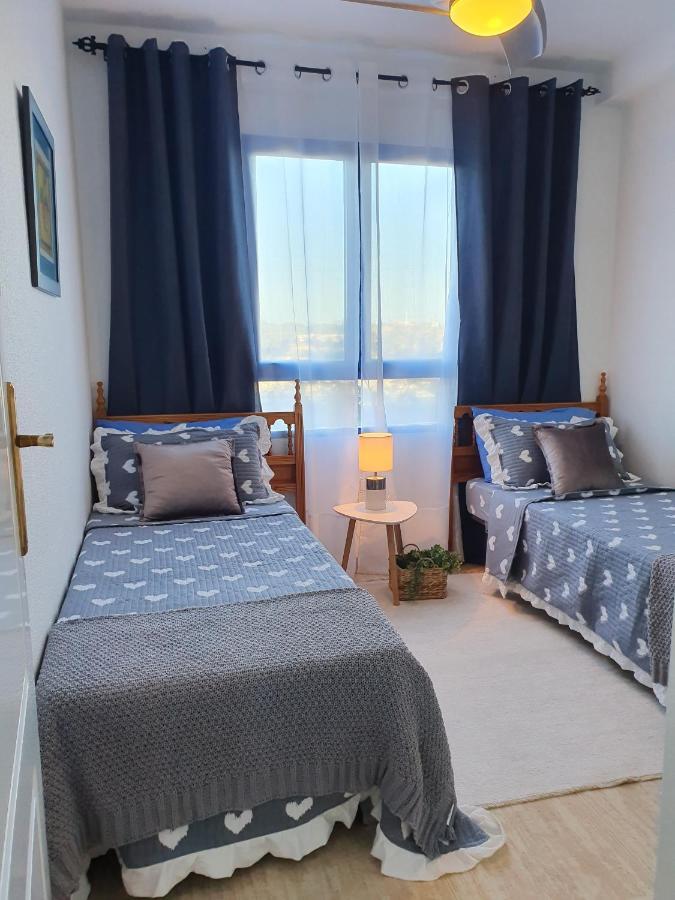 Apartment In Campoamor Overlooking The Swimming Pool Bagian luar foto