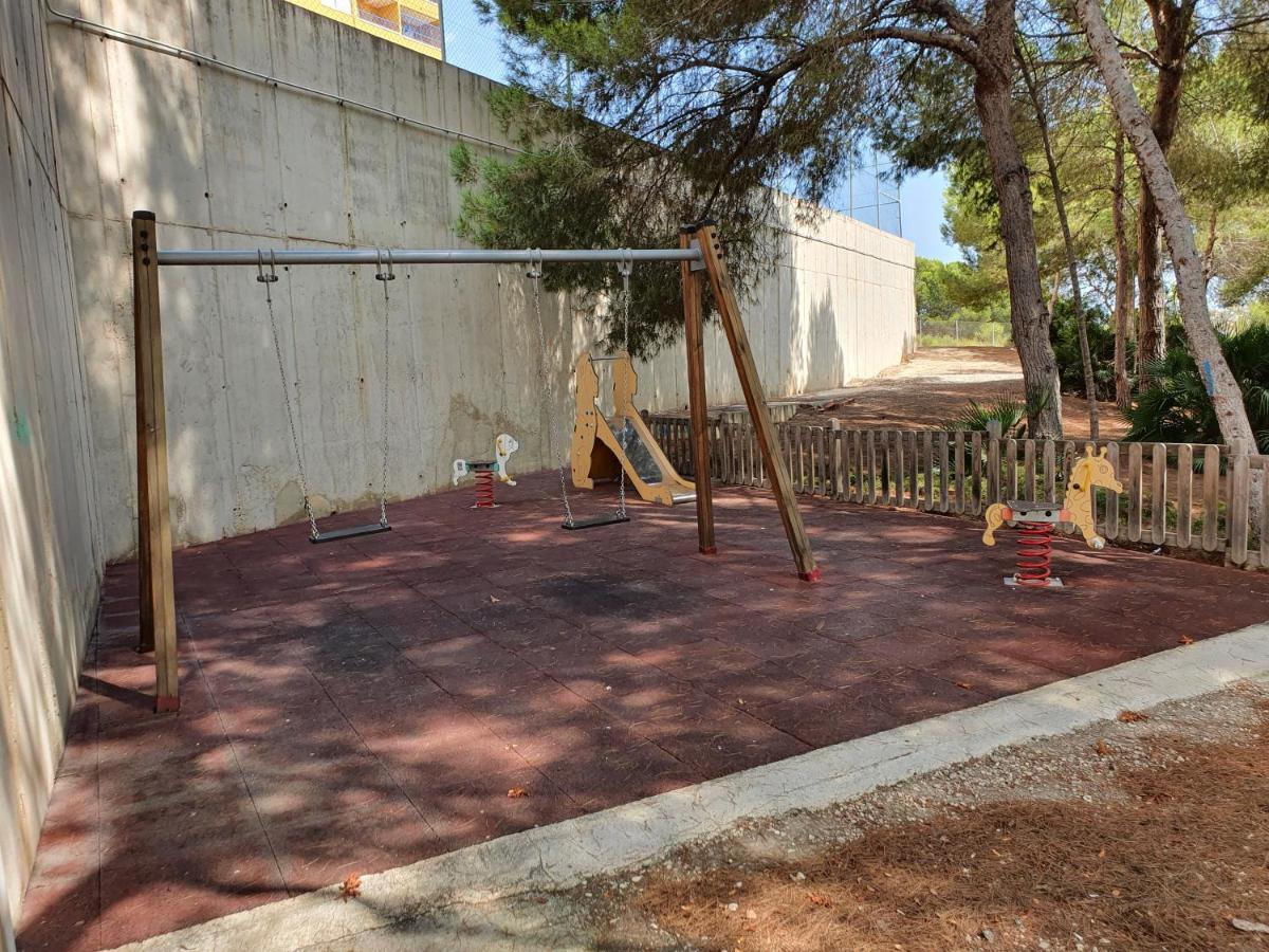 Apartment In Campoamor Overlooking The Swimming Pool Bagian luar foto