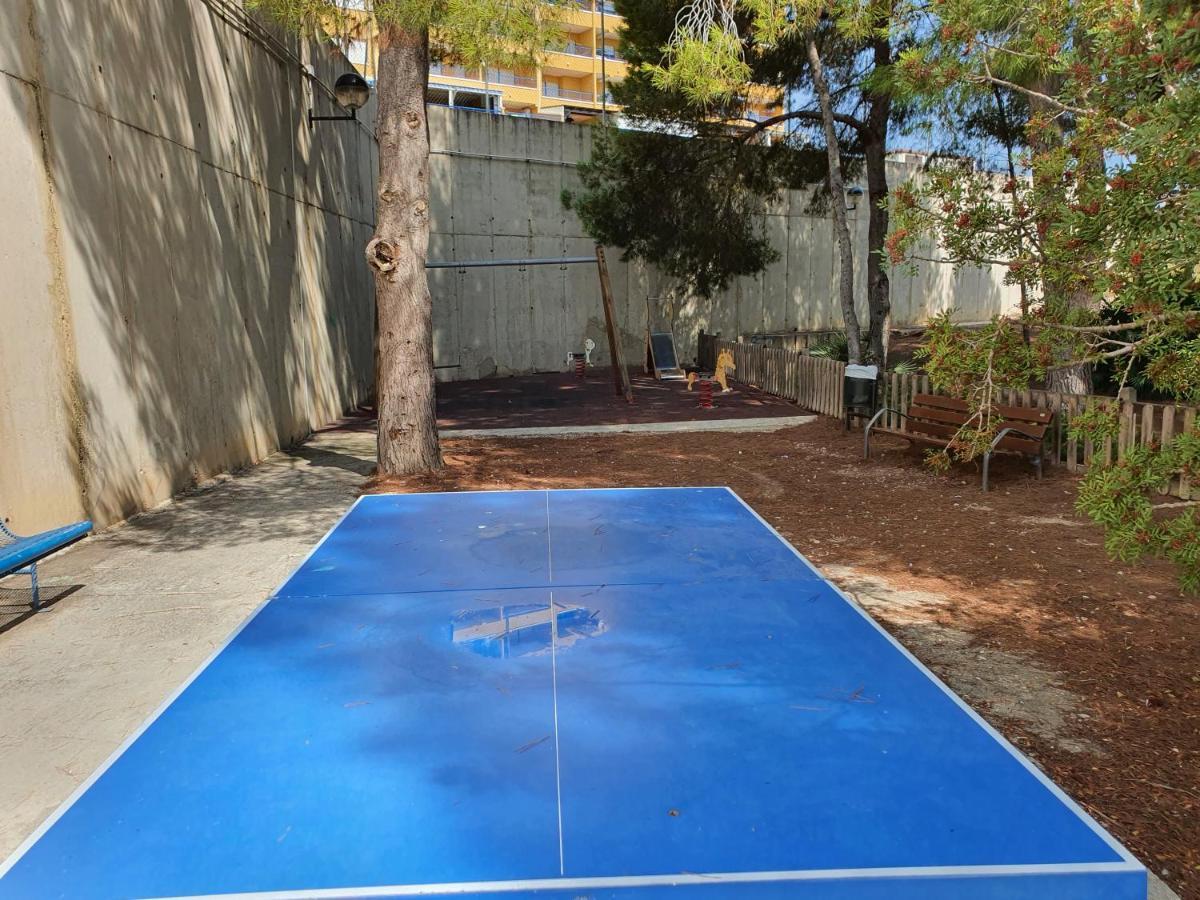 Apartment In Campoamor Overlooking The Swimming Pool Bagian luar foto