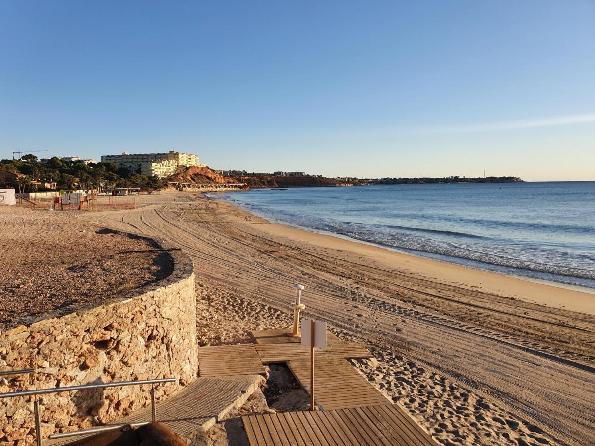 Apartment In Campoamor Overlooking The Swimming Pool Bagian luar foto