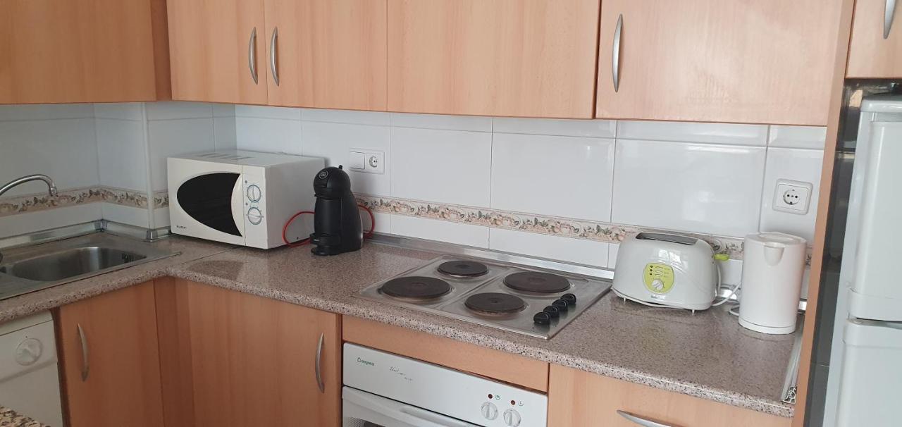 Apartment In Campoamor Overlooking The Swimming Pool Bagian luar foto