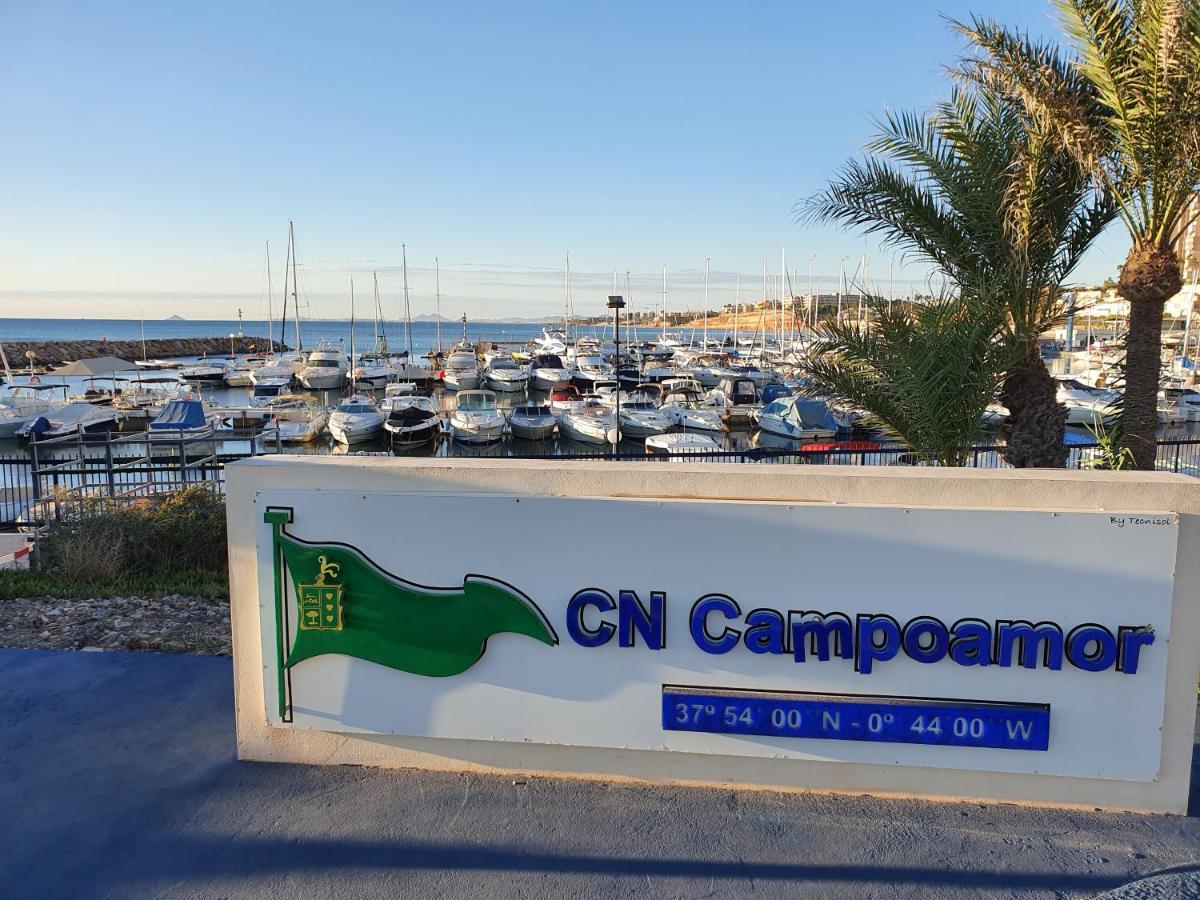 Apartment In Campoamor Overlooking The Swimming Pool Bagian luar foto
